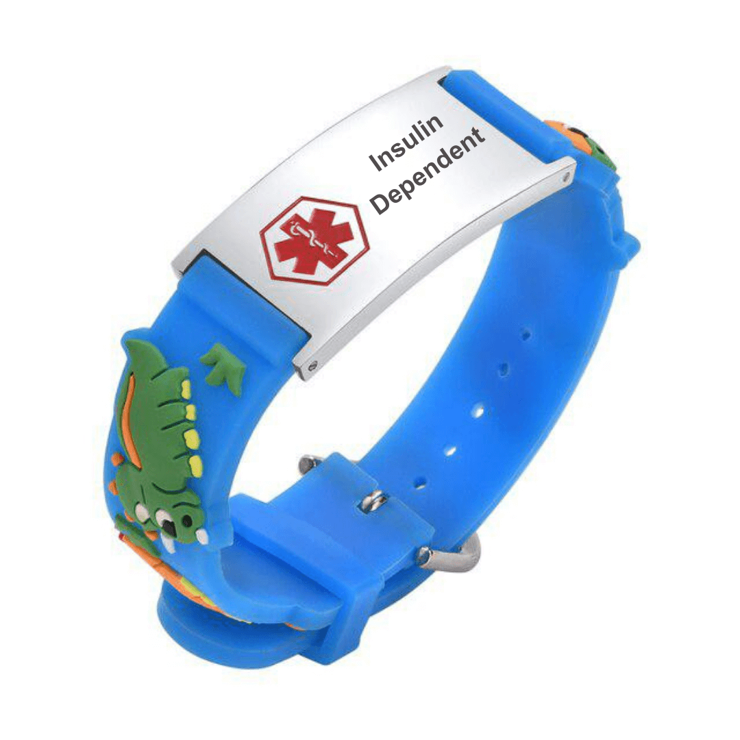 Insulin Dependent medical alert bracelet for a child. Bracelet band is made of blue silicone with a dinosaur design. The alert plate is stainless steel with red medi-alert symbol and 'Insulin Dependent' engraved on the plate.