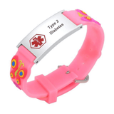 Type 2 medical alert bracelet for a child. Bracelet band is made of pink silicone with a butterfly design. Alert is stainless steel with red medi-alert symbol and 'Type 2 Diabetes' engraved on rectangular plate.